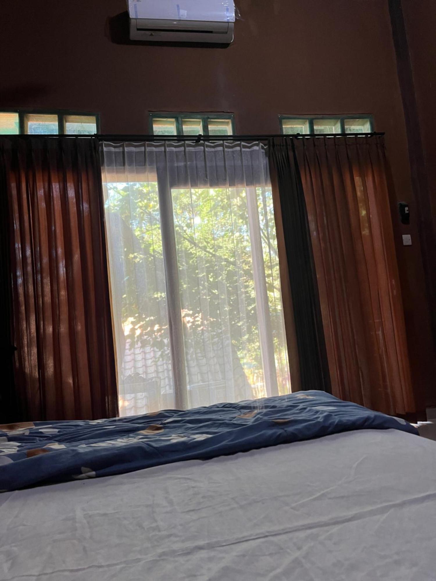 Fullmoon Homestay Kuta  Buitenkant foto